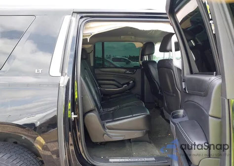 2015 Chevrolet Suburban 1500 Lt z USA, uszkodzony, nr VIN 1GNSCJKCXFR146205